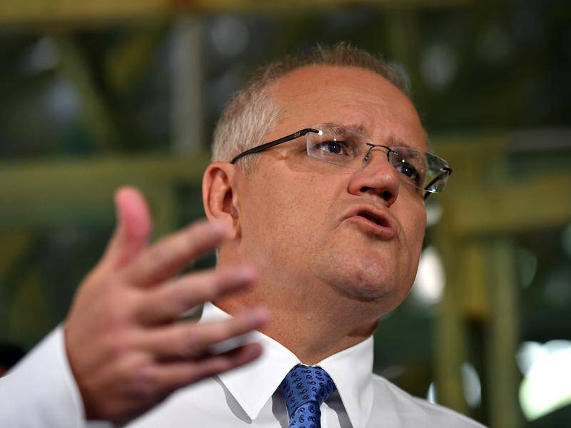 Scott Morrison says a re-elected coalition government will not revisit tax cuts for big business.