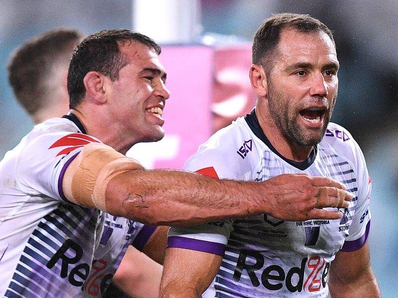 Dale Finucane (l) is one of the favourites to replace Cameron Smith (r) as Melbourne Storm skipper.