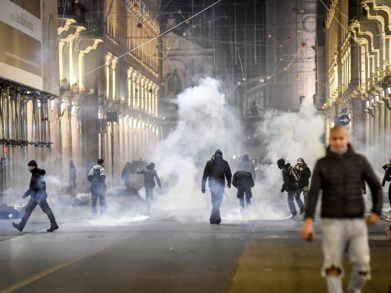 Protests at coronavirus lockdown measures in Italy have broken out in several cities.