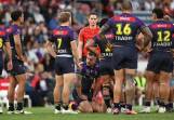 Cameron Munster (c) is to have scans on the groin injury he aggravated on Sunday. (Jason O'BRIEN/AAP PHOTOS)