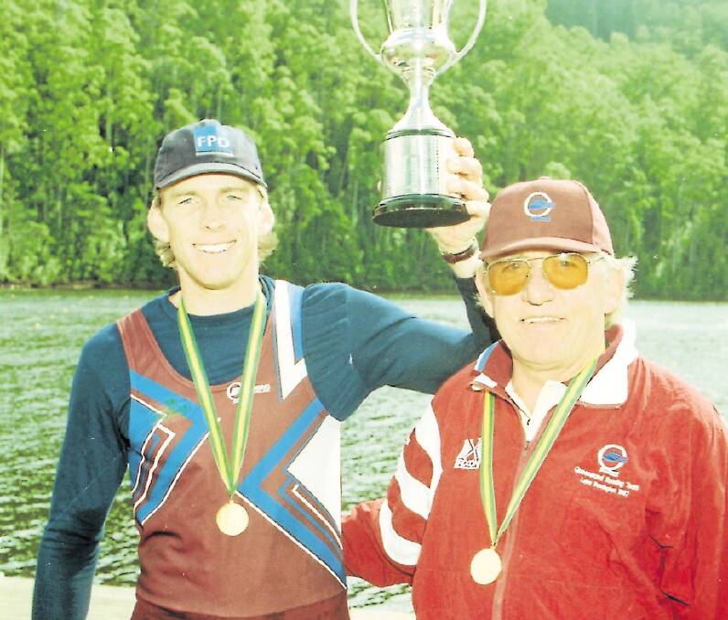 Reg Free and son Duncan at Lake Barrington in 1997 with the President's Cup that would carry both their names after Duncan's win in the interstate single-sculling championship.