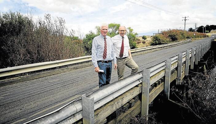 Northern Midlands Mayor David Downie and Lyons Liberal MHR Eric Hutchinson announce federal funding to fix the rickety Westmoor Bridge in Cressy. Picture: GEOFF ROBSON