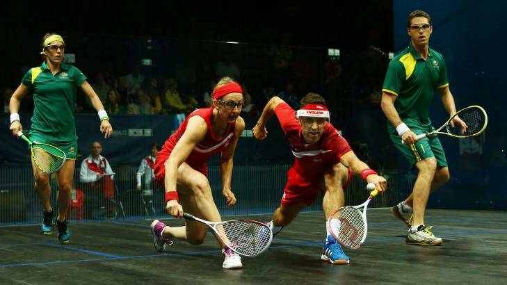 David Palmer and Rachael Grinham on their way to claiming gold for Australia in the mixed squash doubles against English duo Peter Barker and Alison Waters. Photo: Richard Heathcote