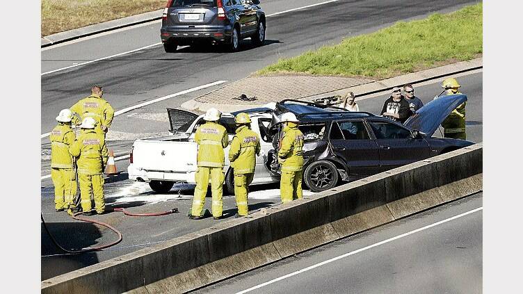 A two-vehicle crash in the southbound lanes of the Southern Outlet forced police to divert traffic onto the Bass Highway. Picture: SCOTT GELSTON