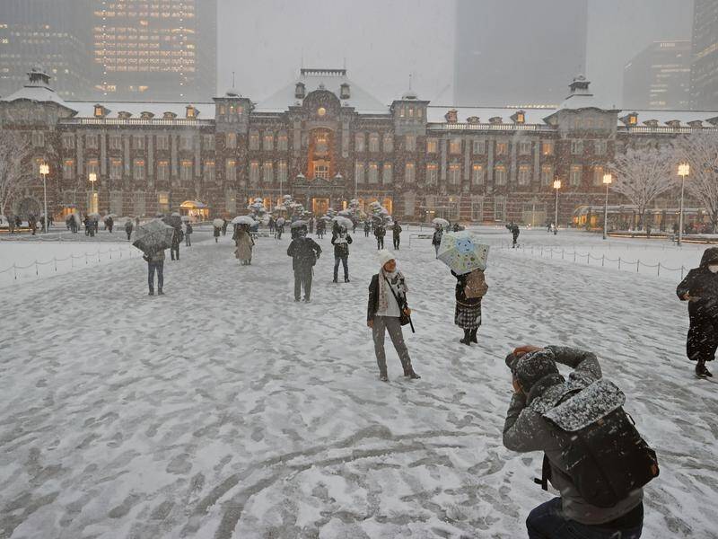 The Japanese capital of Tokyo has shivered under an unusually prolonged snowfall.