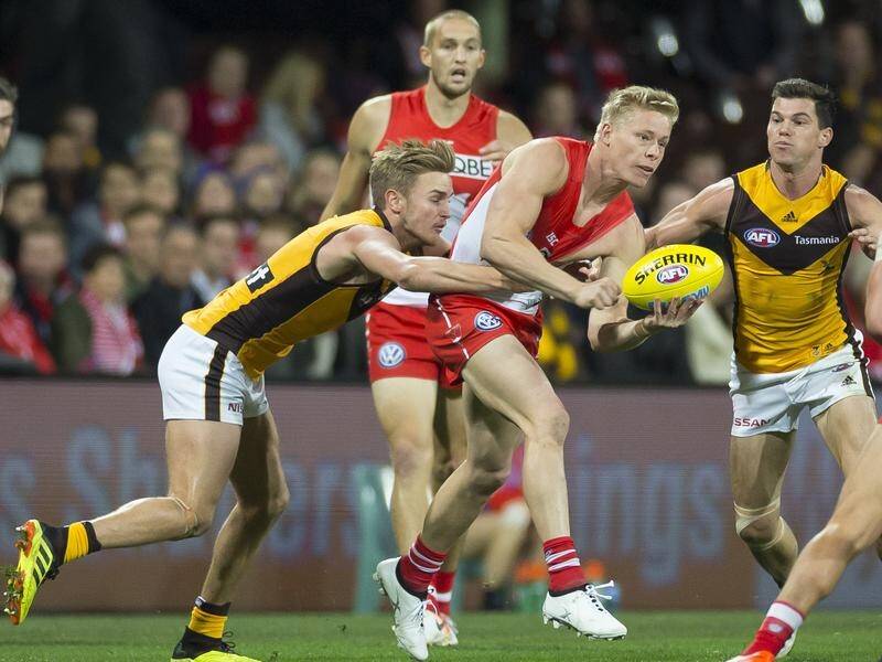 Isaac Heeney (c) says the Swans are focussed on making the AFL finals, not John Longmire's future.