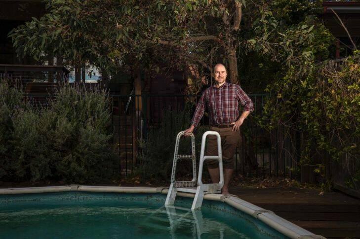 Sydney Fri 8Sept17: Chris Dunstan makes the most of solar energy, and an app that monitors the household consumtion and costs. It's cheaper to pump the pool water in peak hour than during off peak. Photo Michele Mossop  