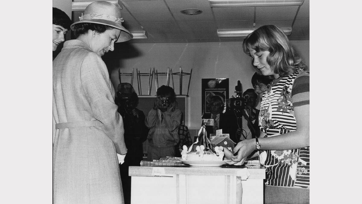 Queen Elizabeth and Prince Philip's 1977 royal visit | During the tour of Bridgewater High School's home economics department, the Queen has a chat with Sally Enniss, 14, of Bridgewater.