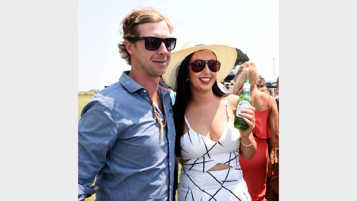 Sarah Dick of Launceston in a photo with English Polo Team captain James Beim. Picture: NEIL RICHARDSON