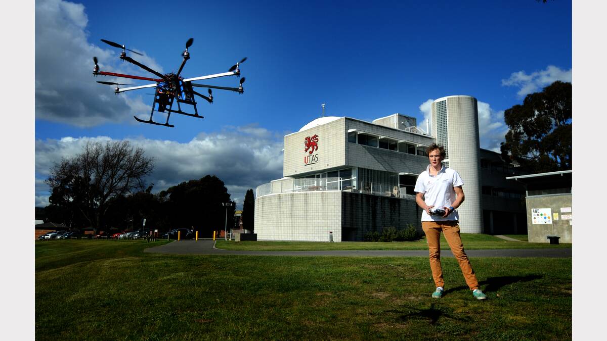 Working with robots: Zac Pullen is studying ocean engineering with his octocopter. Picture: Geoff Robson