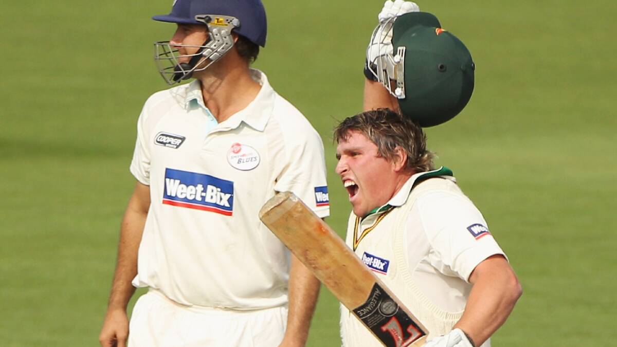 Mark Cosgrove, pictured celebrating during the Tigers' Sheffield Shield win in 2011.