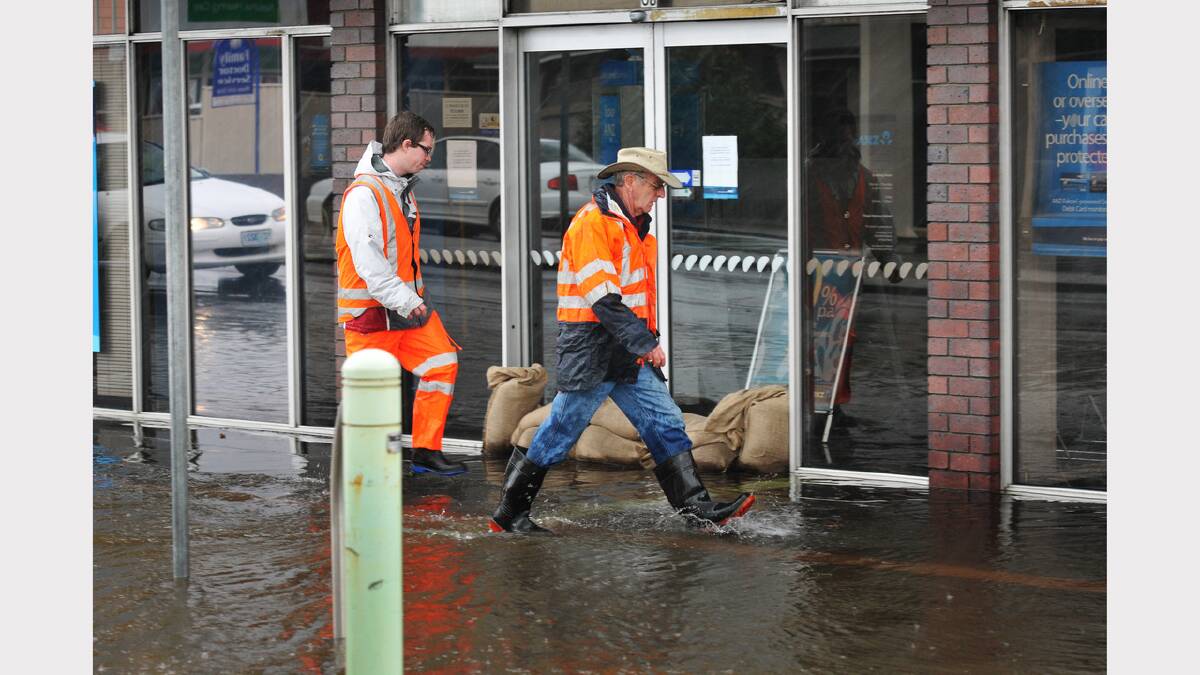 Businesses on Kings Meadows' Hobart Road were hit by flash-flooding last year.