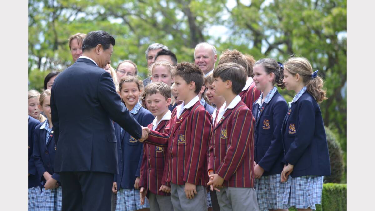 President Xi Jinping greets Scotch Oakburn College pupils. Picture: Georgie Burgess