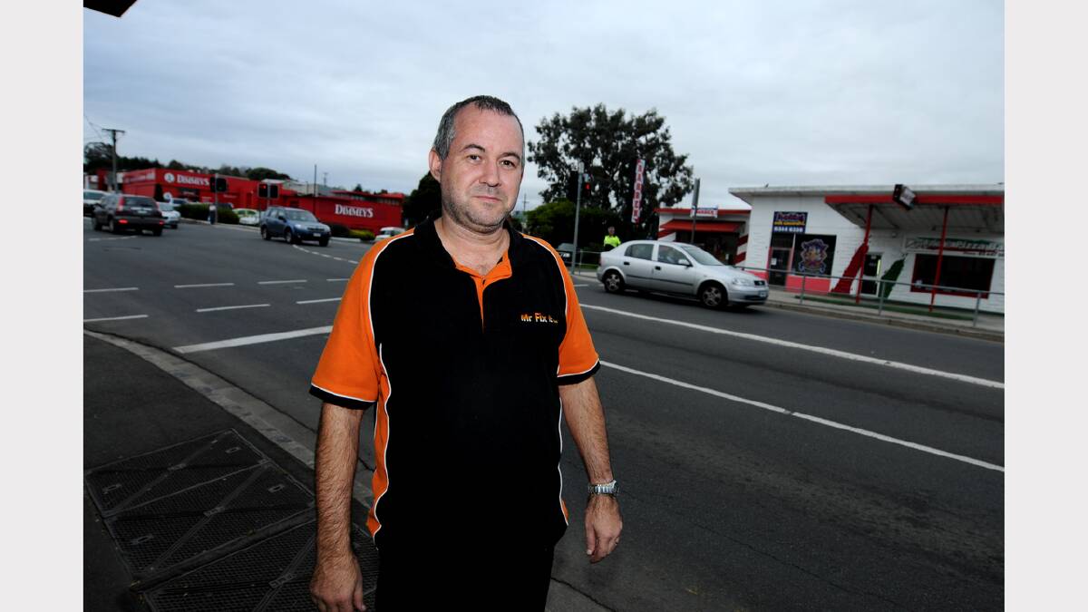 Mr Fix It owner Nathan Hess at the Kings Meadows intersection. Mr Hess is among retailers who are concerned about proposed changes to the busy intersection. Picture: GEOFF ROBSON