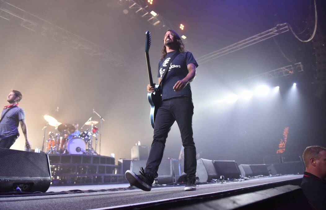 Ever-rocking Foo Fighters frontmand Dave Grohl takes to the stage of the Derwent Entertainment Centre. Picture: Scott Gelston