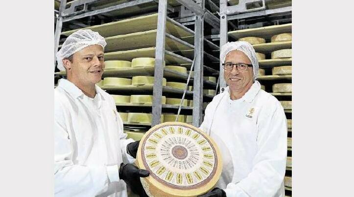 Lion cheesemakers Adam Davis and Craig Liston with the Australian Grand Dairy Awards grand champion cheese, the Heidi Farm gruyere.