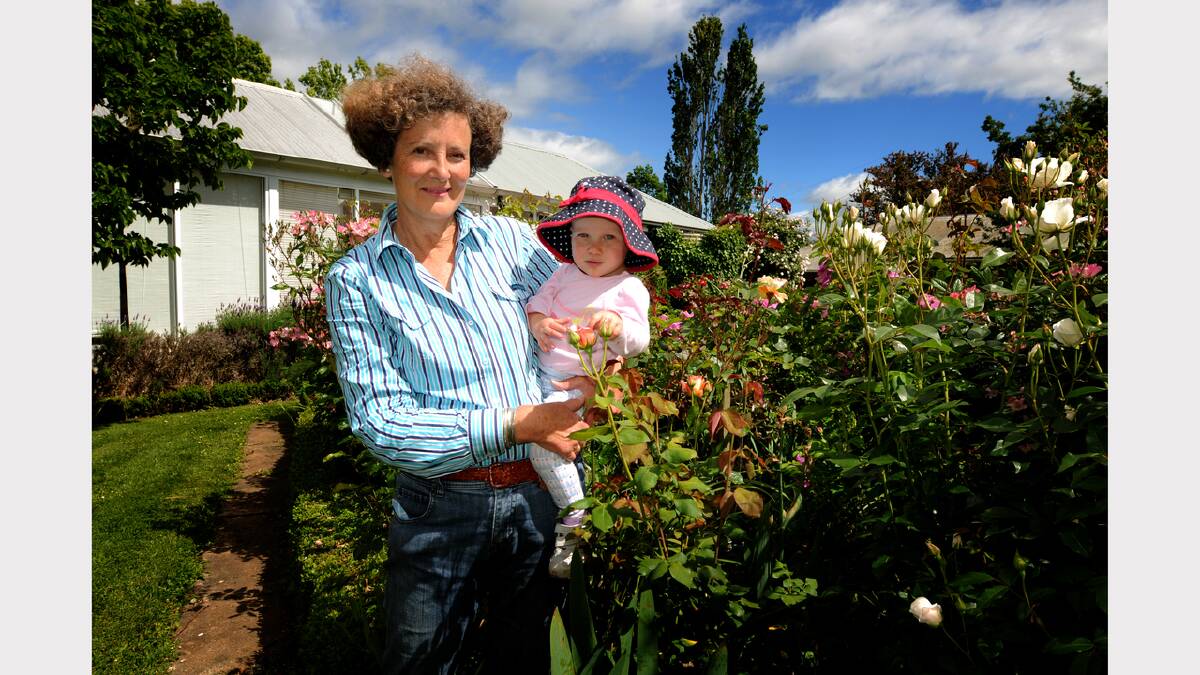 Blenheim Farm owner Jennie Chapman and granddaughter Zoe Livingston, 1, get ready for the garden event. Picture: GEOFF ROBSON