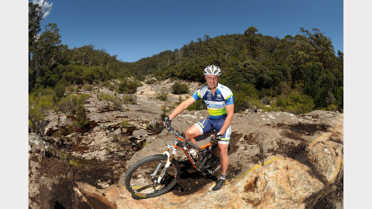 Dorset general manager Tim Watson rides his mountain bike on one of the Blue Derby mountain bike trails.