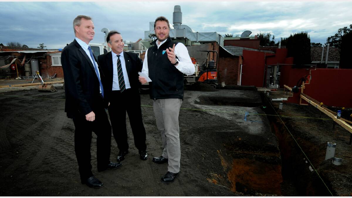 Primary Industries and Water Minister Jeremy Rockliff, Bass Liberal MHR Andrew Nikolic and Tasmanian Salmonid Growers Association chief executive Adam Main at the site of the new research facility at Mount Pleasant laboratories. Picture: GEOFF ROBSON