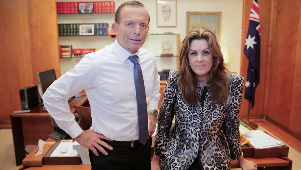 
Close relationship: Tony Abbott with Peta Credlin in his office in early 2014. Courtesy of Peta Credlin