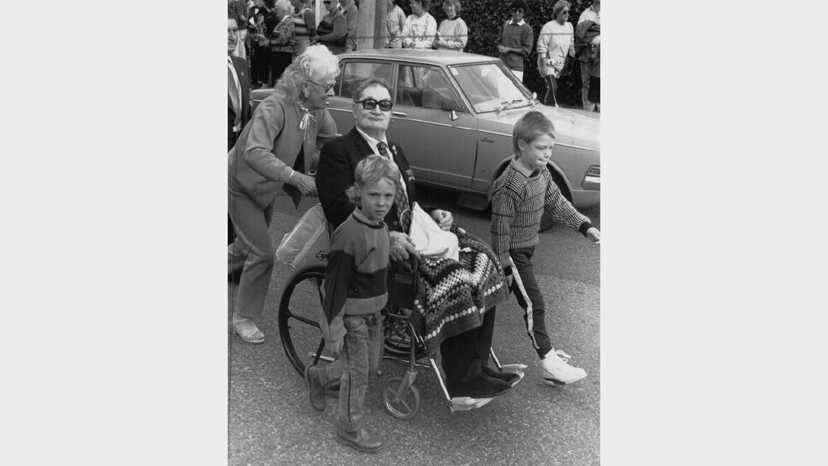 Anzac Day flashback gallery | Captain John Wilkinson-Reed takes part in the 1989 Devonport parade with wife Peggy and great-grandsons Joshua Treloar and Tim Phipps.