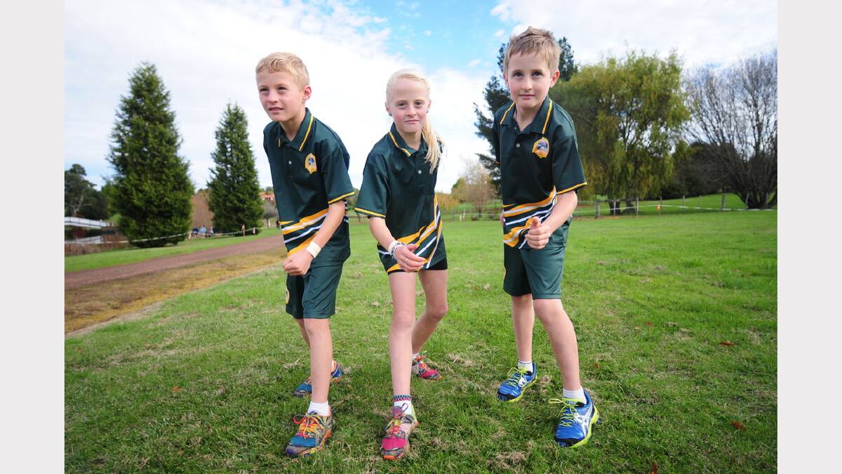 Longford Primary School distance running pupils (and triplets) Mitchell, Abbie and Luke Butler, 9.