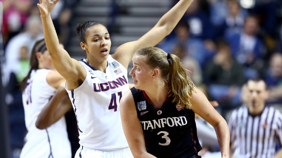 Launceston Tornadoes recruit Mikaela Ruef, playing for the Stanford Cardinals, looks to pass against Kiah Stokes, of the Connecticut Huskies, in the first half of the NCAA Women's Final Four semi-final in April. Picture: GETTY IMAGES