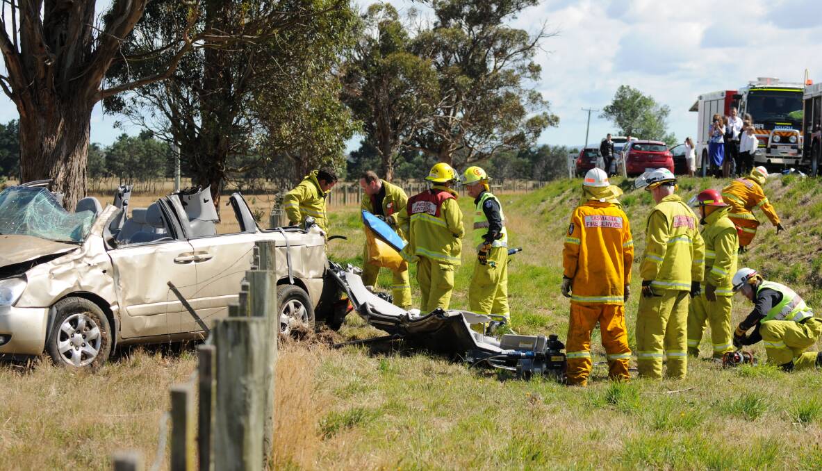 A mini-van rolled in a single-car crash on the Midland Highway near Perth on Sunday morning. Picture: Paul Scambler