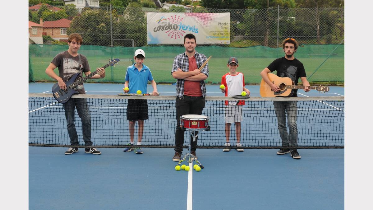 Josh Hann, 13, and brother Thomas, 11, with Sam Arnold, Curtis Hodgetts and Andrew Kruesmann, prepare for the rock 'n' tennis club challenge at Trevallyn. Picture: PAUL SCAMBLER