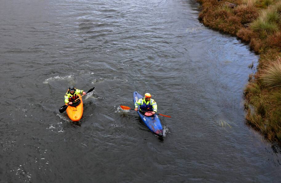 Police kayakers search the South Esk River. Picture: Neil Richardson