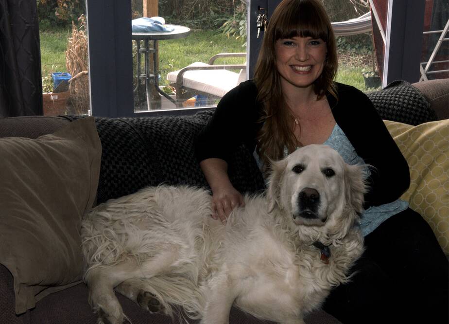 Amy Luttrell, at home with dog Henry. Picture: NEIL RICHARDSON