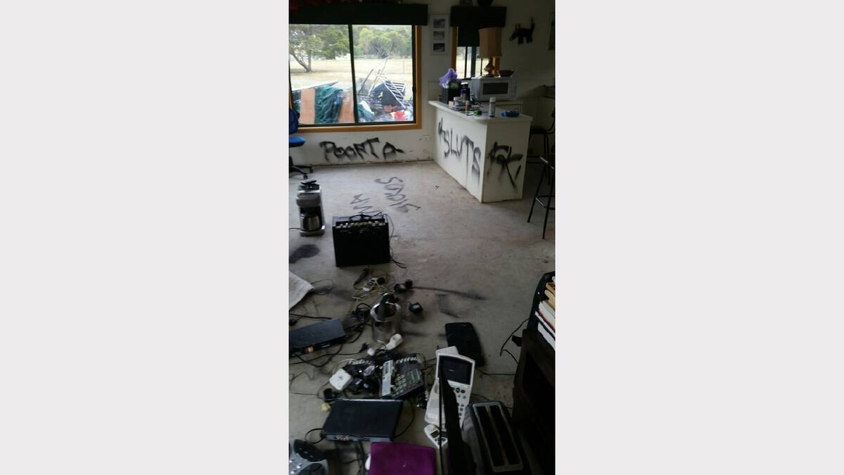 The inside of Lavinia Pike's property that was vandalised with homophobic remarks after their home was flooded last week.