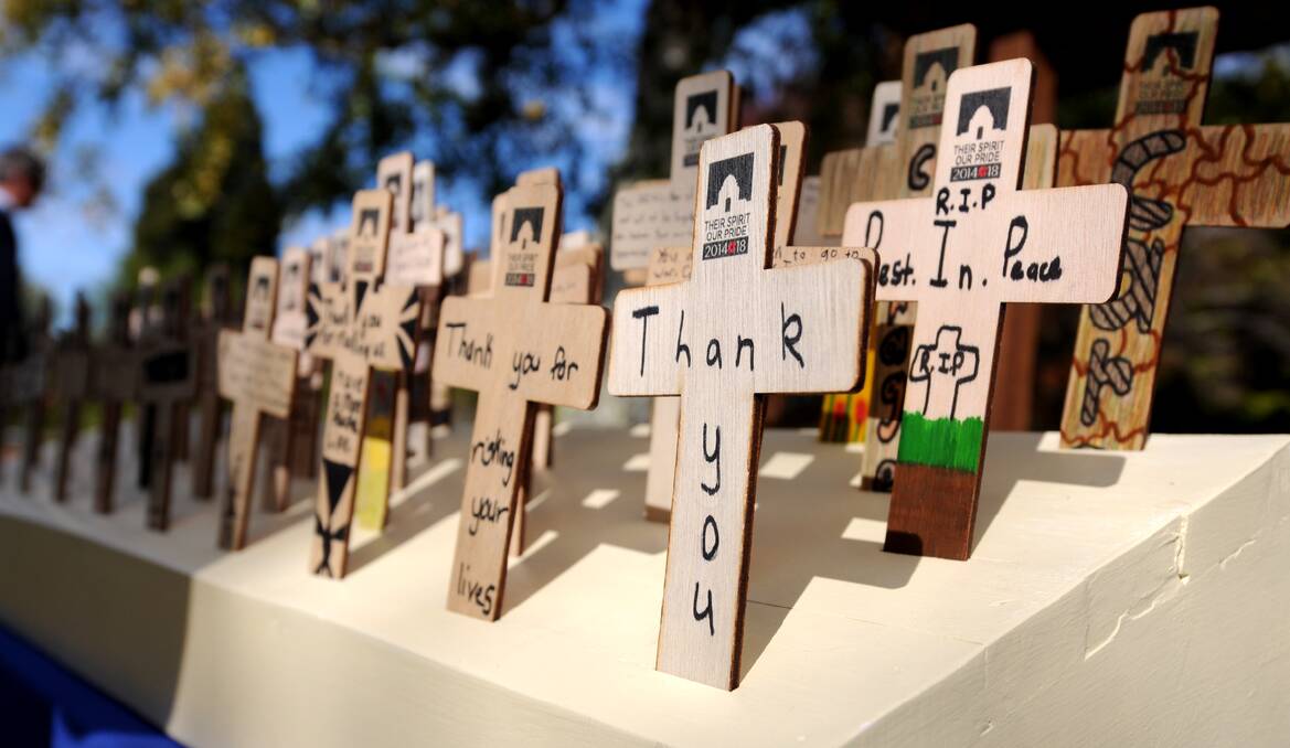 Evandale Primary School pupils wrote messages to soldiers who never returned home. The wooden crosses were displayed at the town's Anzac Day services. Picture: Geoff Robson