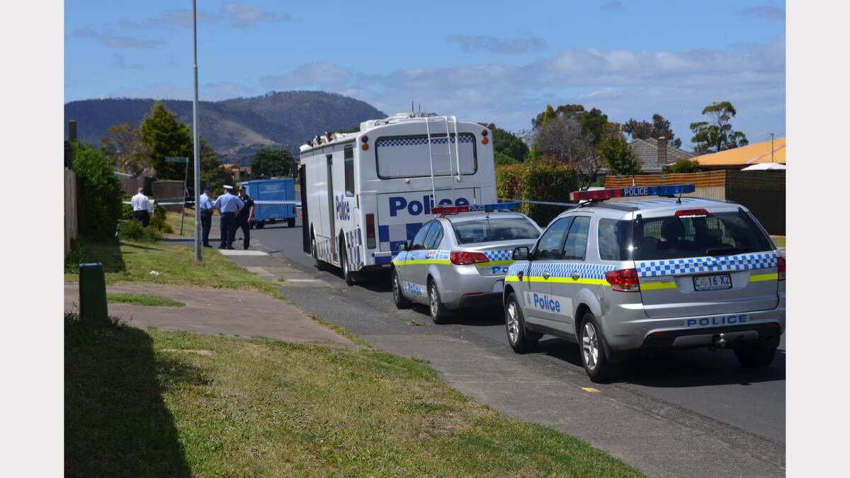Police investigators outside a Bridgewater home where two men appear to have killed each other. Picture: GEORGIE BURGESS