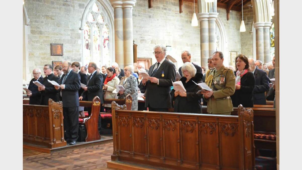 Lieutenant Governor Alan Blow joined about 200 people people at St Davids Cathedral to make 100 years since the declaration of World War I. Picture: Georgie Burgess