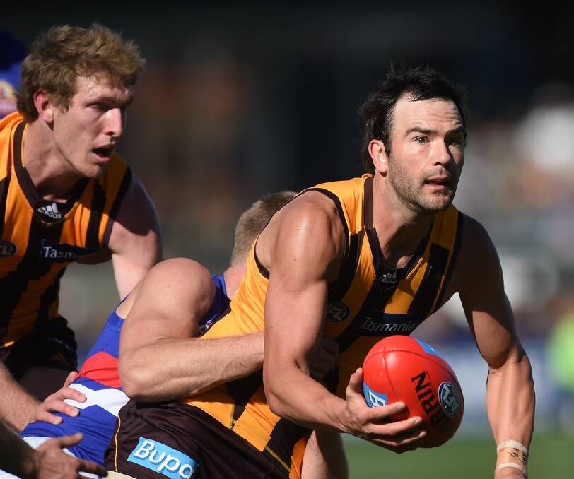 Hawthorn's Jordan Lewis is out of today's clash with Gold Coast with a shoulder injury.