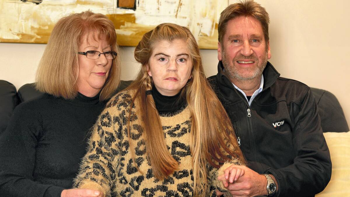  Sharyn and Col Burston, of Kings Meadows, with daughter Kate, are full of praise for the National Disability Insurance Scheme. Picture’: PHILLIP BIGGS