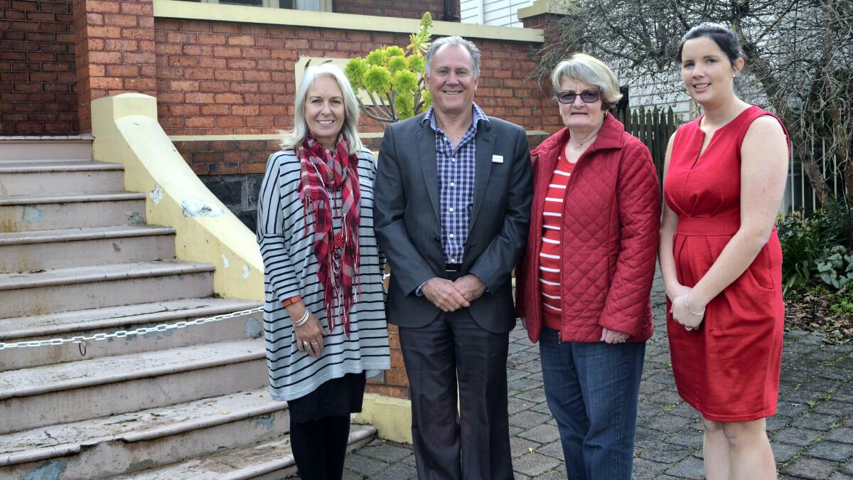 Volunteering Services Australia business officer Karen Leahey, chief executive Richard Patterson, Launceston Volunteers for Community president Christine Fordham and Volunteer Services Australia project officer Kylie Bryan outside the new Volunteering Services Australia Launceston office. Picture: EMILY BAKER