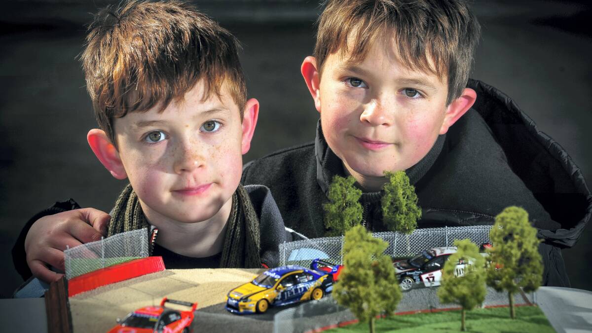Brothers Jonte, 10, and Hunter Lee, 8, look at a model section of the Bathurst track at the Launceston scale model swap meet, at Inveresk Showgrounds. Picture: PHILLIP BIGGS