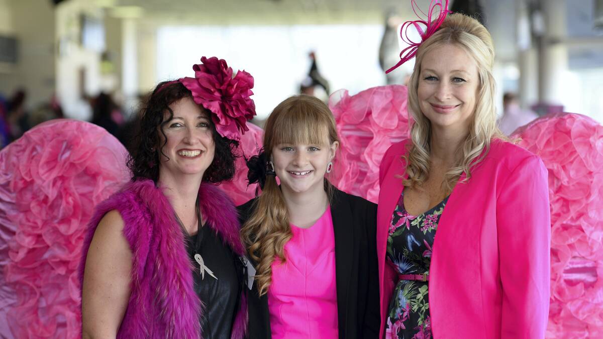 At yesterday's   Think Pink Cup  were Judi Adams, of Hobart, Abbey Caskie, 12, and Dalene Francis, of Legana. Picture: MARK JESSER
