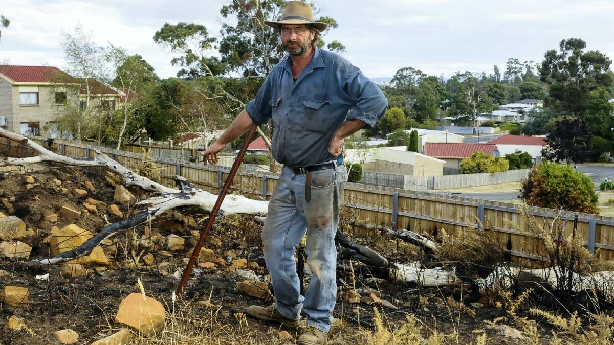 Farmer Grant Heazlewood is frustrated at constantly having to mend his fences cut by trail bike riders and destroyed by arsonists and car thieves. Picture: NEIL RICHARDSON