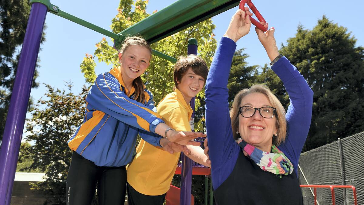 Trevallyn Primary School principal Cheryl McFadzean with  school captains Gabby Hill and  Darcy Lockwood, both 12. Picture: MARK JESSER