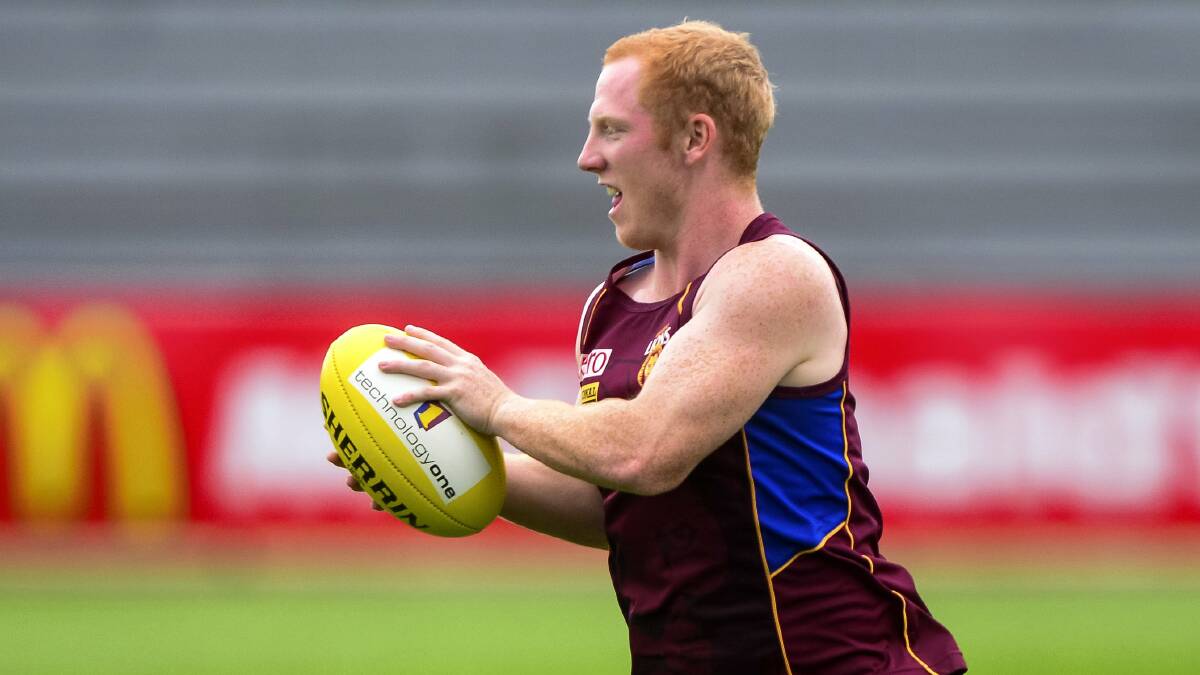 Former Clarence  and now Brisbane player Josh Green  trains yesterday at Aurora Stadium ahead of today's big game. Pictures: PHILLIP BIGGS.