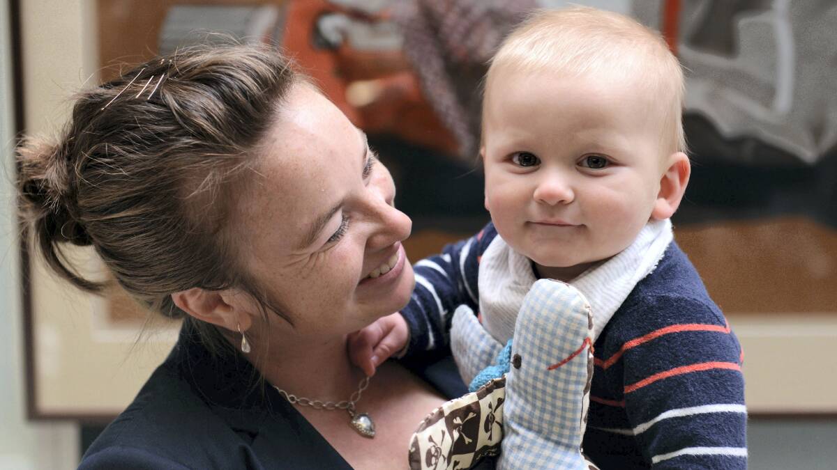Dr Mai Frandsen with her son, 10-month-old Oliver Crawford. Dr Frandsen has received a $95,000 fellowship to assist pregnant women to quit smoking. Picture: SCOTT GELSTON