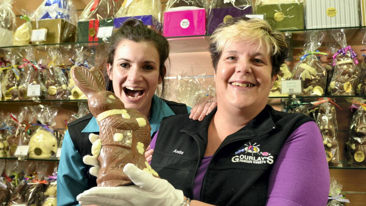 Rachel Slater and owner of Gourlay's Sweets Anita Wood with one of the store's chocolate ``Rupert'' rabbits. Picture: MARK JESSER
