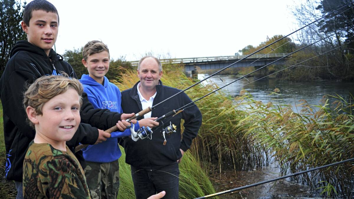 Cressy junior anglers keen to fish for next season are Hayden Morris, 11, Jack Coulter, 14, and Jakeb Morris, 14, with Cressy Trout Expo president Richard Goss at Brumbys Creek.