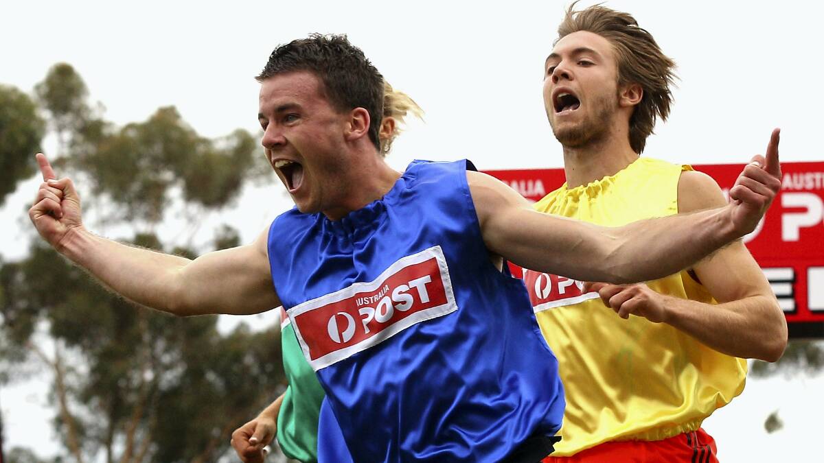 Riverside's Andrew Robinson crosses the line to win last year's Stawell Gift. Robinson is looking forward to defending his title over the Easter weekend. Picture: GETTY IMAGES.