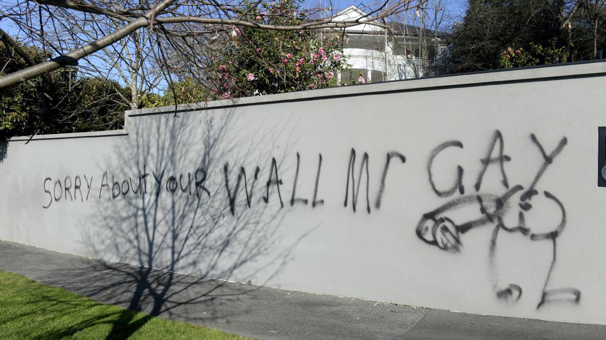 Graffiti on the wall of John Gay's Launceston home. Picture: MARK JESSER