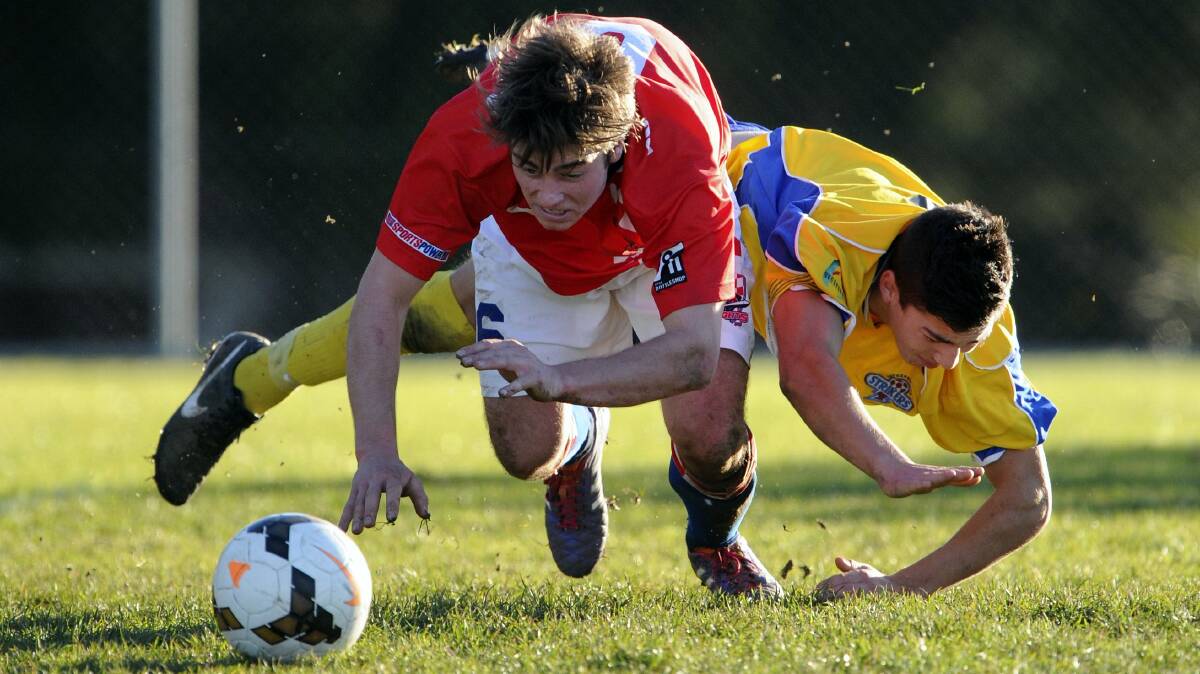 Prospect Knight Anton La Palombara and Devonport's Mike Danna take a tumble in their clash yesterday. 
