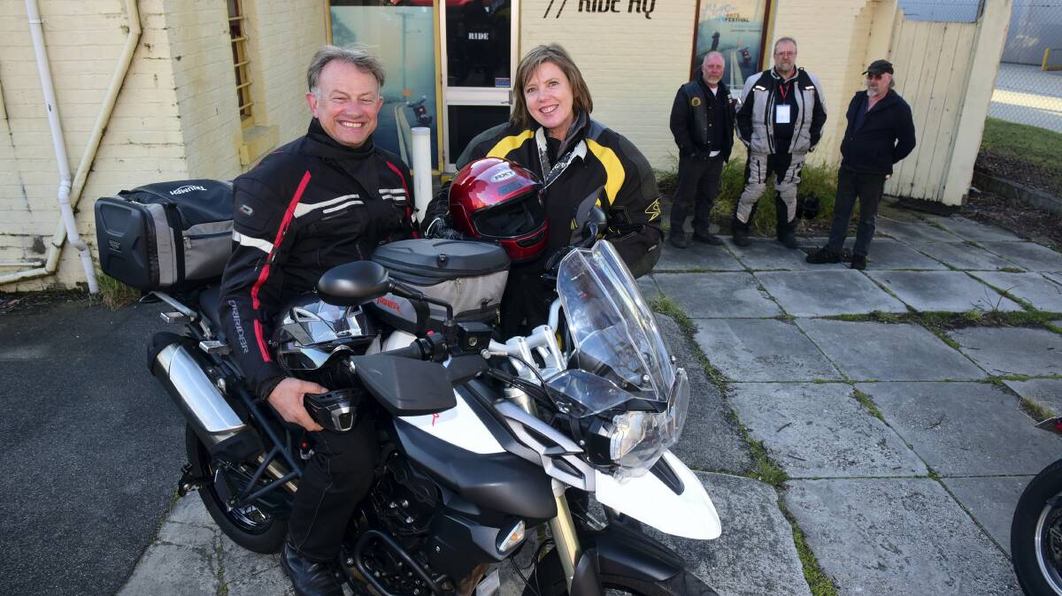 Grantley gets ready to share his passion for motorbikes and riding with arts reporter Mary Machen. Picture: PAUL SCAMBLER
